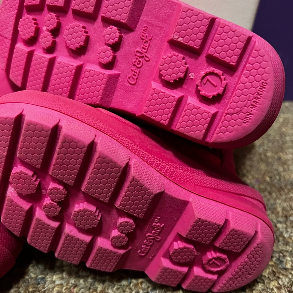 Size 7 Pink cat and jack snow boots. $10 each or $15 for both pairs